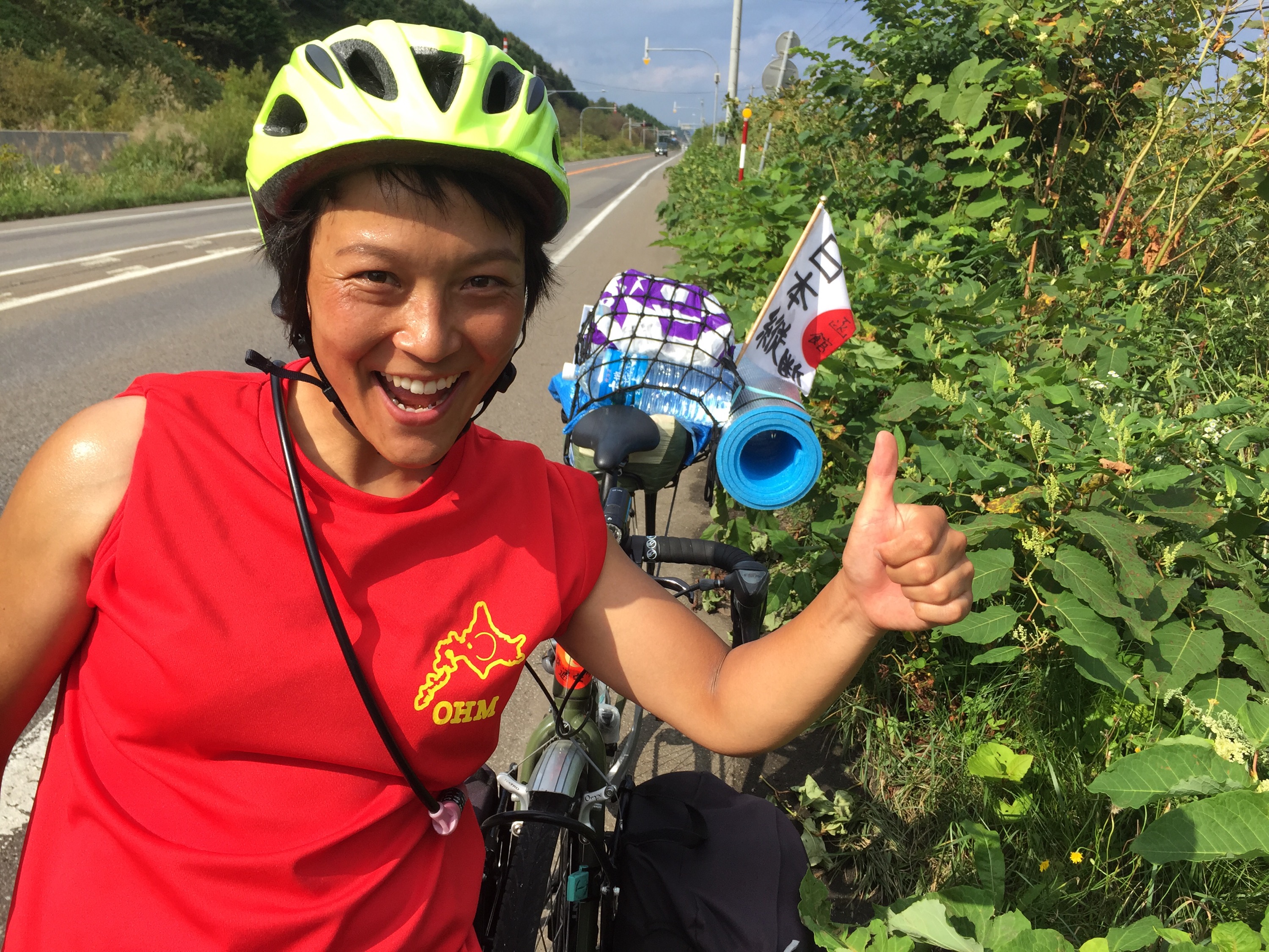 Cyclotouriste japonaise dans le sens sud Nord 